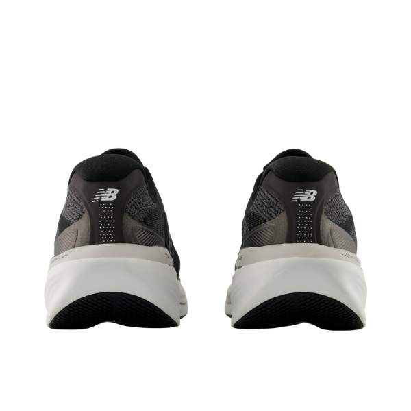 Rear view of NEW BALANCE Men’s 860V15 Wide in black/white with white soles on a white background.