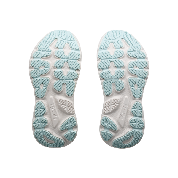 Two green and navy HOKA New Balance Women's Gaviota 6 soles with textured tread, shown on a white background.