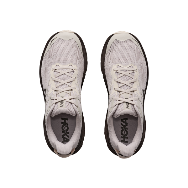 A pair of HOKA Men's Challenger 8 Grey trail shoes with black soles and white laces on a white background.