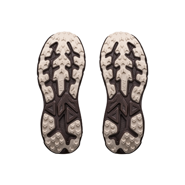Two HOKA Men's Challenger 8 Grey shoe soles with rugged treads, viewed from below on a white background.