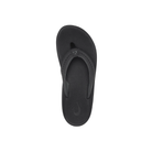 An OLUKAI Women's Ulele Black flip-flop with a supportive footbed is shown top-down on a white background.