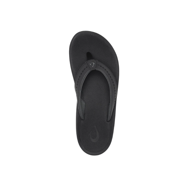 An OLUKAI Women's Ulele Black flip-flop with a supportive footbed is shown top-down on a white background.