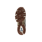 Brown and white sole of NEW BALANCE U530cob men's shoes, with black and blue accents, on a white background.