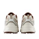 NEW BALANCE U530cob men’s running shoes in white/beige with brown soles, shown from the back.