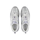 NEW BALANCE Men's U530 in grey/silver, shown from above with purple accents on a white background.