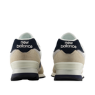 NEW BALANCE U574 Sea Salt/Linen unisex sneakers with beige suede and navy accents; New Balance logo on heel.