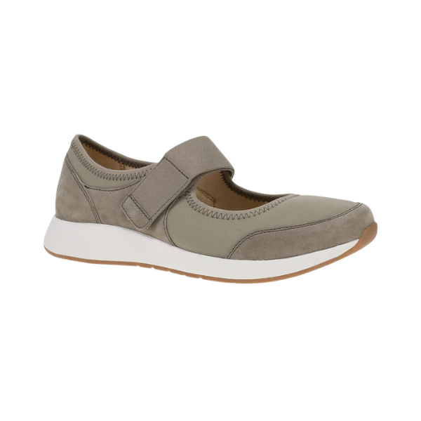 DANSKO Women’s Carolina sneaker in walnut suede features a Velcro strap, white sole, and tan bottom.
