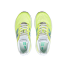 A pair of NEW BALANCE Women’s FuelCell Rebel v5 Wide Green/Grey running shoes, top view on a white background.