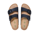 The Birkenstock Womens Arizona Flex Platform Black sandals feature double straps with adjustable metal buckles, tan footbeds, green vegan symbols on the insoles, and are crafted from vegan materials.