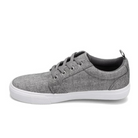 The Rival Womens Tilt Grey Chambray by RIVAL, INC. features a gray canvas upper, white abrasion-resistant rubber outsole, black laces, and a heel pull tab, shown from the side against a white background.