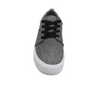 The Rival Mens Tilt Grey Chambray by RIVAL, INC. is a gray canvas sneaker with black laces, a white rubber outsole, and padded collar, displayed front view on a white background.