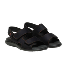 The ARCOPEDICO Arcopedico Womens Sumava Sandal Black features cushioned soles, adjustable hook and loop closures, and orange stitching accents for stylish comfort.