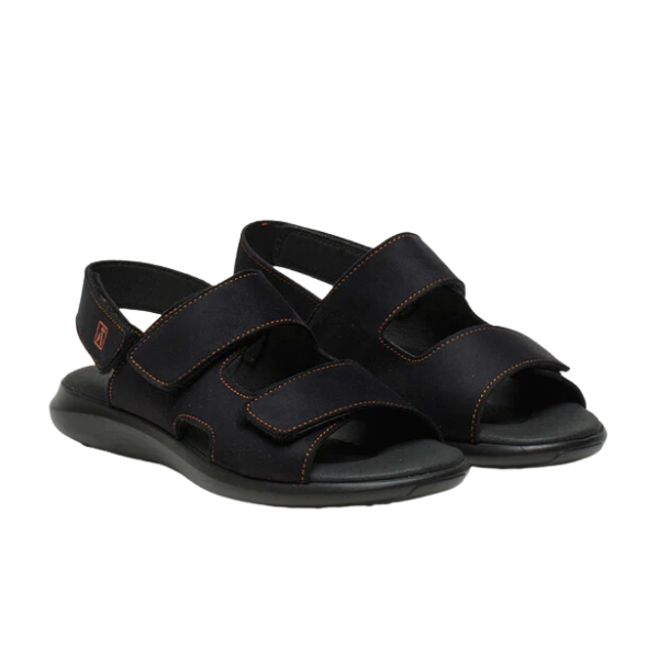 The ARCOPEDICO Arcopedico Womens Sumava Sandal Black features cushioned soles, adjustable hook and loop closures, and orange stitching accents for stylish comfort.
