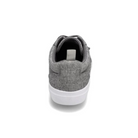 A Rival Womens Tilt Grey Chambray sneaker by RIVAL, INC., featuring a white abrasion-resistant rubber outsole, is shown from the back against a plain white background.