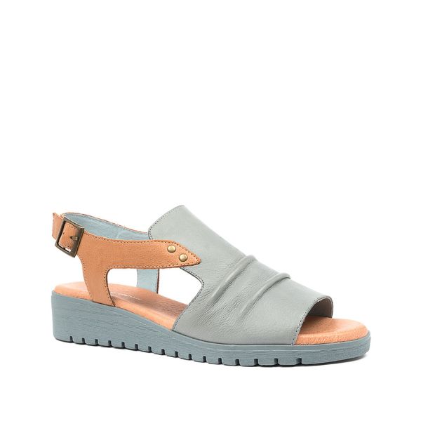 The Django & Juliette Womens Madis Steel Leather Gray/Tan sandal features a stylish ruched gray leather upper, tan buckle heel strap, open toe, and low platform sole for comfortable, all-day wear from DJANGO & JULIETT.