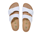 A pair of BIRKENSTOCK Womens Arizona Flex Platform sandals in white, featuring two adjustable buckle straps and cork footbeds, shown from above on a white background.