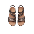 CLARKS Womens Kitly Ave Bronze sandals, featuring two adjustable straps, a peep-toe design, and a Contour Cushion footbed for comfort, are shown against a white background.