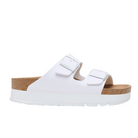 The BIRKENSTOCK Womens Arizona Flex Platform sandal in white features two buckle straps, a cork footbed, and a white rubber sole, displayed in a side profile.