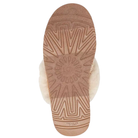 UGG Women's Cozy Cream features a geometric tread sole and visible fur with a plush sheepskin lining.
