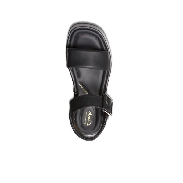 The Clarks Womens Alda Strap Black Leather sandals feature two Wide straps, a side buckle, square toe, and Contour Cushion Footbed for comfort, shown top-down on a white background. Brand: CLARKS.