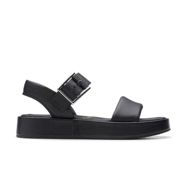 The Clarks Womens Alda Strap Black Leather sandal by CLARKS features a thick platform sole, open toe, Wide front strap, large silver ankle buckle, and a contour cushion footbed for all-day comfort.