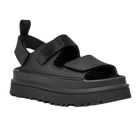 The UGG Womens Goldenglow Sandals in black feature an open-toe, chunky platform design with adjustable Velcro straps, thick treaded sole, and a heel pull tab—modern, comfortable sandals ideal for everyday wear.