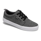 The Rival Mens Tilt Grey Chambray by RIVAL, INC. is a low-top sneaker with a grey chambray upper, black laces, white rubber outsole, padded collar, and a small side tag for comfort and style.