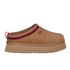UGG Womens Tazz Slippers in Chestnut feature a thick platform outsole, red and white patterned trim around the ankle, red heel pull tab, cozy UGGplush™ lining, and a visible UGG logo on the side.