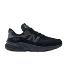 The New Balance Mens 990v6 Black sneaker by NEW BALANCE is shown from the side on a white background, featuring black and dark gray mesh and suede materials, the N logo, 990 label, and MADE in USA details.