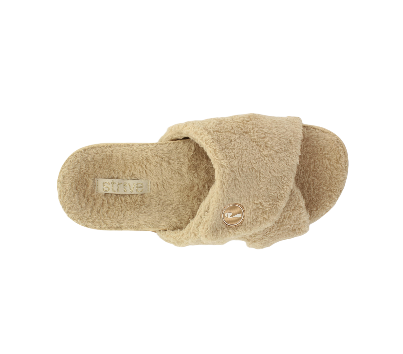 The Strive Womens Zoey Nude slipper is beige and fuzzy, with open toes, criss-cross straps, a round metallic emblem on the side, and a branded insole featuring arch support and Biomechanical Footbed Technology.