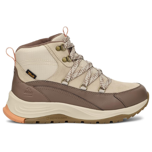 The Teva Womens Auroris in Feather Grey/Acorn is a waterproof hiking boot featuring orange accents, thick laces, a padded ankle, rugged rubber sole, and a MAX-COMF insole for extra comfort on the trails.