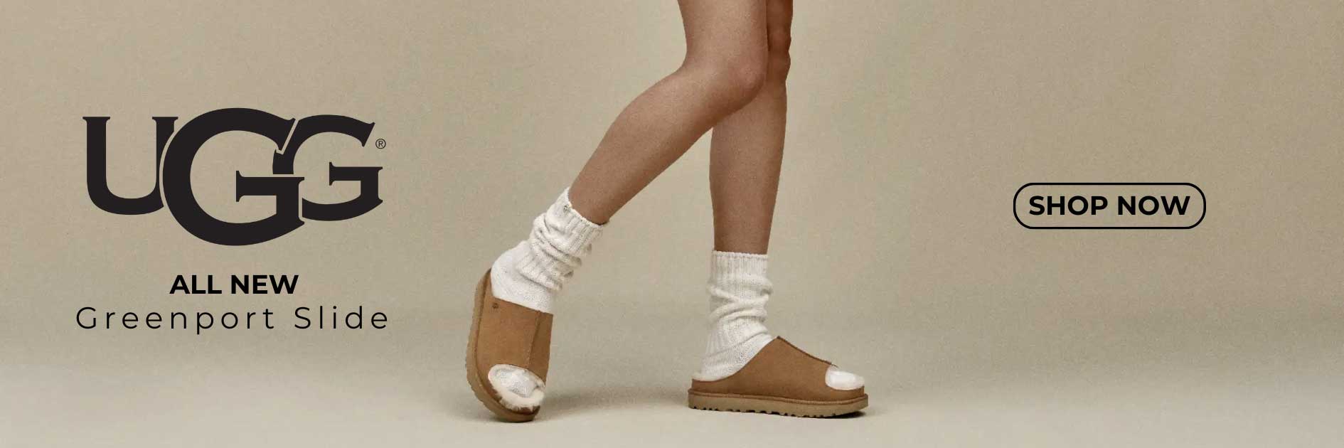 UGG Greenport Slide sandals with white socks on a beige background