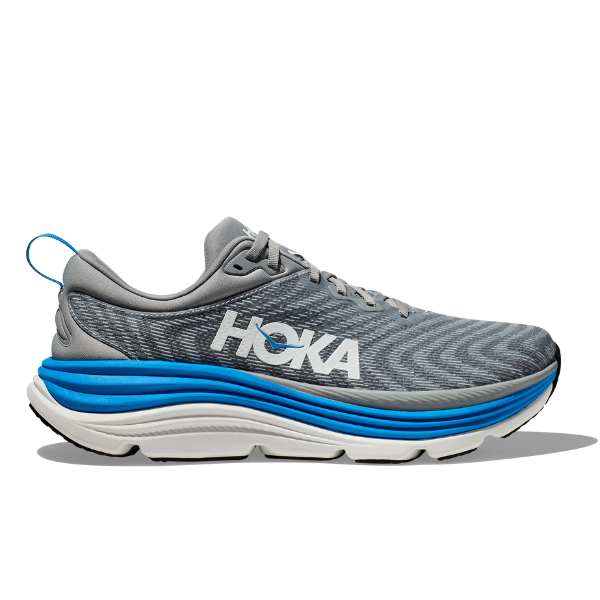 The HOKA Mens Gaviota 5 Wide in Limestone/Blue features a thick white sole with blue and black layers, H-Frame support, a low-cut design, heel loop, and white HOKA logo on the side.