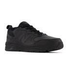The New Balance Womens WX857 V3 Wide Black training shoe features a low-top design, lace-up closure, textured sole, signature N logo, and ROLLBAR technology, displayed on a white background.