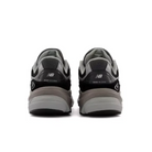 The New Balance Women’s 990 V6 Black running shoes, shown from the back with black and gray accents and visible Made in U.S.A. and New Balance logos, are ideal for those seeking relief from Plantar Fasciitis pain.
