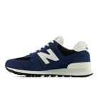 NEW BALANCE Men's 574 Navy/White sneaker, navy suede overlays and white N logo, medial side view.