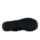 NEW BALANCE Men's 574 Navy/White sneaker, patterned rubber outsole for everyday traction, sole view.