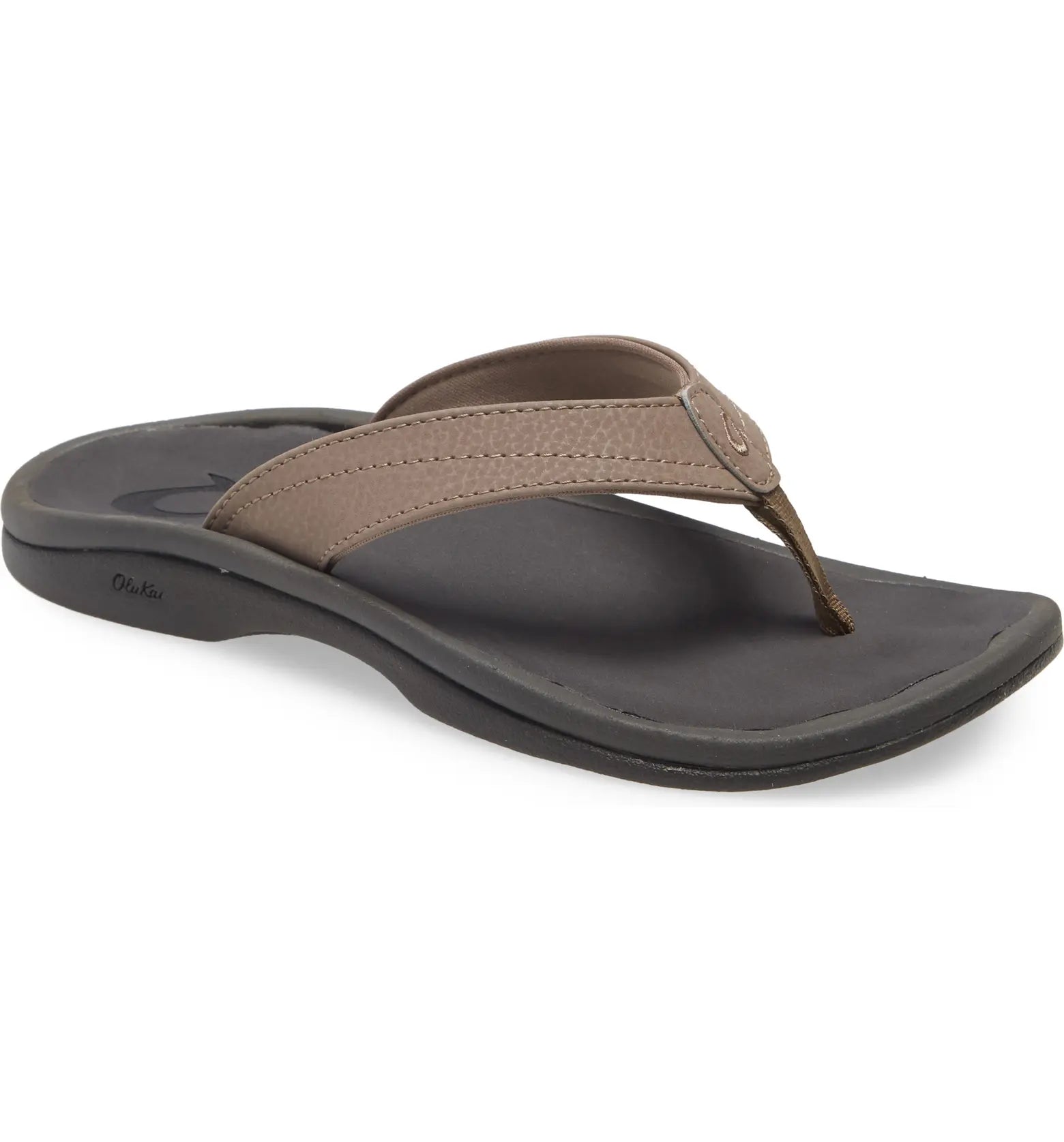 The OLUKAI Womens Ohana Taupe sandal features a thick, cushioned sole and a Wide brown leather strap. Water-resistant, its displayed at an angle to showcase its anatomical footbed from both the top and side views.