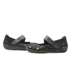 The Arcopedico Womens Cosmo Black by ARCOPEDICO features textured soles, side floral patterns, and adjustable top straps—perfect for foot pain relief and all-day comfort.