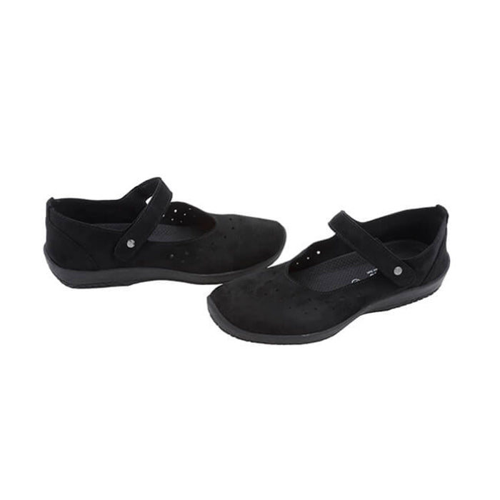 The Womens Arcopedico Sisley Black from ARCOPEDICO are vegan-friendly Mary Jane flats featuring a rounded toe, perforated detailing, and a single strap with button closure.