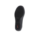 The ARCOPEDICO Womens Arcopedico Sisley Black shoe features a black sole with a textured tread, a slightly raised heel, and a small red and white Sisley logo, highlighted in mary-jane style against a plain white background.
