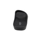 The Sovella Mens PF Slide Black is a black open-toe slide sandal with a textured footbed and Sovella branding near the heel. Its thick sole provides arch support, making it perfect for comfort and recovery.