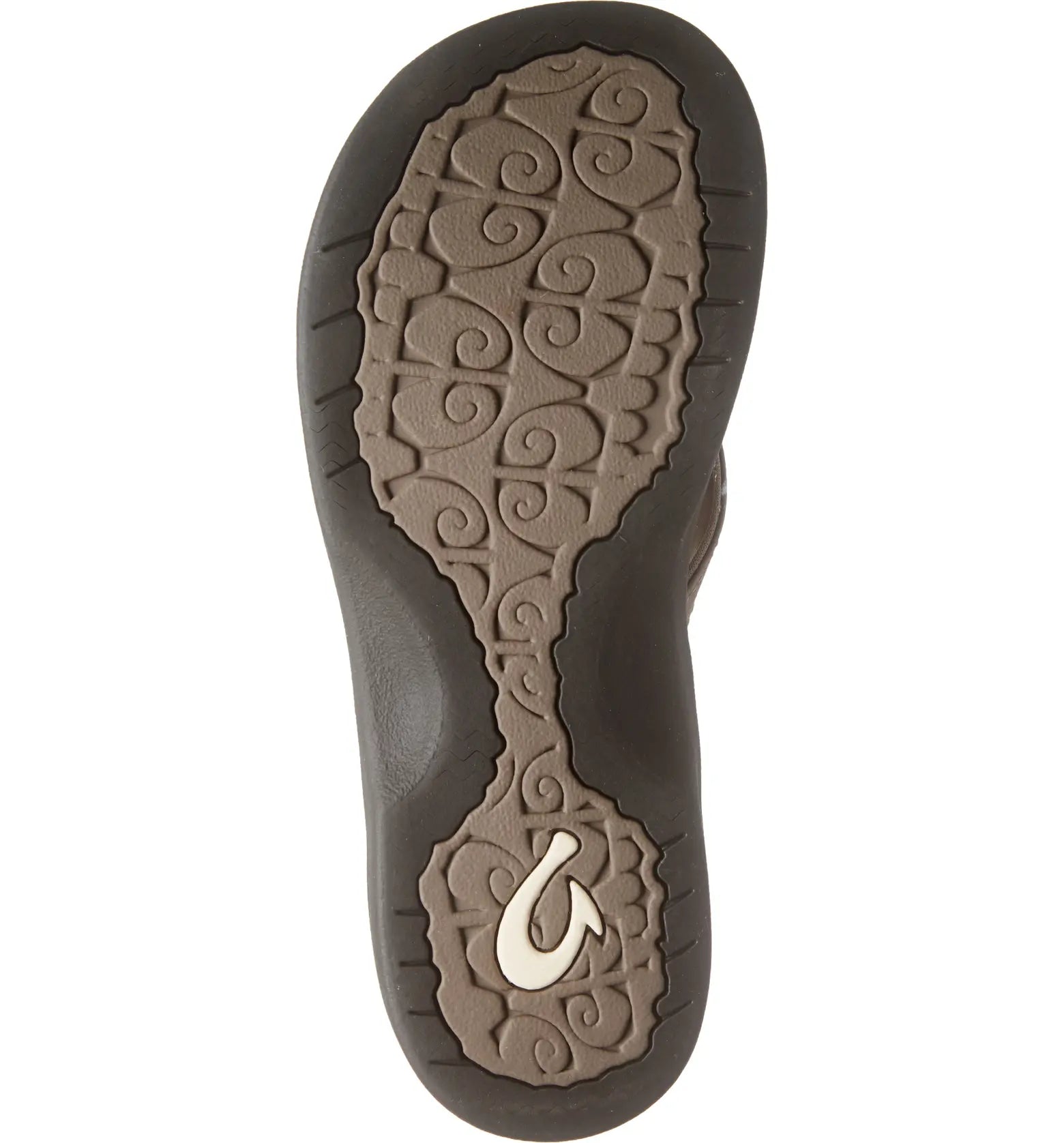 The image shows the sole of the OLUKAI Womens Ohana Taupe sandal, featuring a textured swirl pattern with a looped design near the heel in lighter and darker taupe shades, highlighting its water-resistant construction.
