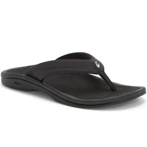 The OluKai Womens Ohana Black/Black sandal features a cushioned Drop-in Comfort footbed and soft fabric thong strap, displayed at an angle on a plain white background.