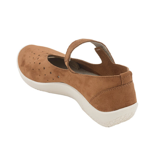 The Arcopedico Womens Sisley Brown by ARCOPEDICO features a brown suede upper, white sole, perforated toe, and adjustable strap. Shown from an angled back view, this stylish Mary Jane is also vegan-friendly.
